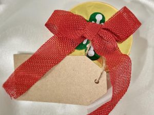 Tejcsokoládé Tallér Piros Masnival Csengettyűvel ( feliratozható kártyával ) 49 g ( storz )